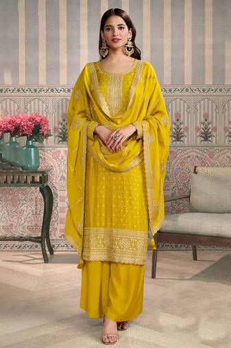 Yellow color viscose chiniya silk fabric ethnic embroidered salwar kameez