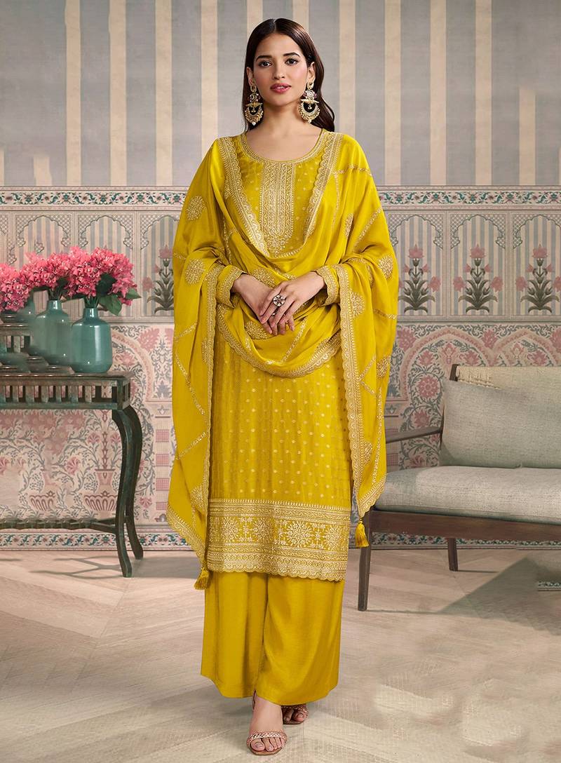 Yellow color viscose chiniya silk fabric ethnic embroidered salwar kameez