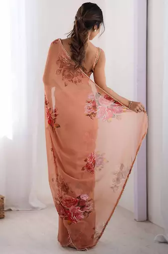 peach floral printed ceremonial georgette saree