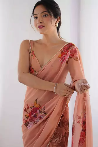 peach floral printed ceremonial georgette saree