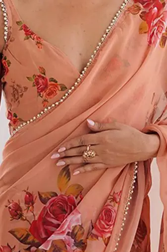 peach floral printed ceremonial georgette saree