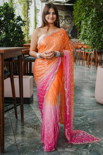 orange color trendy fendy satin fabric pedding with beads hand work saree