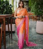 orange color trendy fendy satin fabric pedding with beads hand work saree