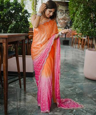 orange trendy satin pedding with beads hand work saree 4
