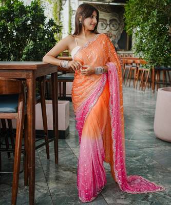orange trendy satin pedding with beads hand work saree 5