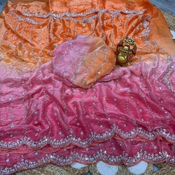 orange trendy satin pedding with beads hand work saree 6