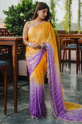 yellow color trendy fendy satin fabric pedding with beads hand work saree