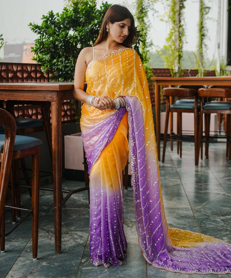 yellow color trendy fendy satin fabric pedding with beads hand work saree