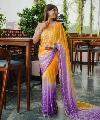 yellow trendy satin pedding with beads hand work saree 3