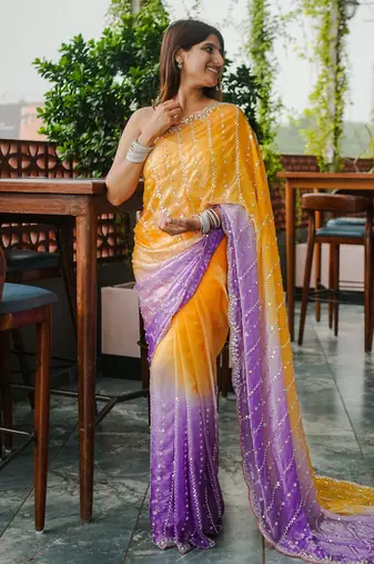 yellow trendy satin pedding with beads hand work saree