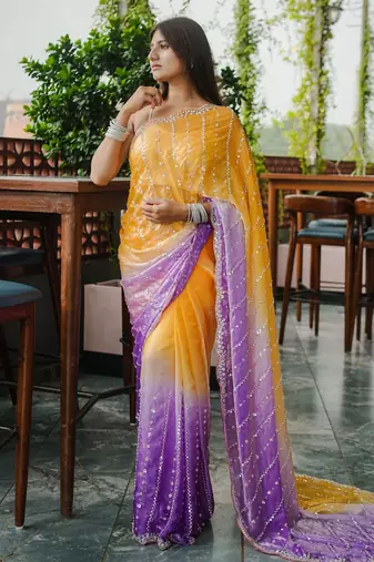 yellow trendy satin pedding with beads hand work saree