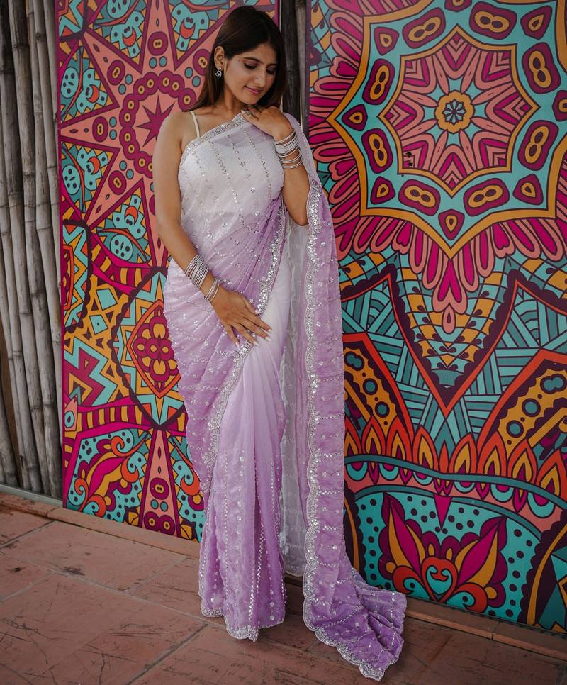 purple color trendy fendy satin fabric pedding with beads hand work saree