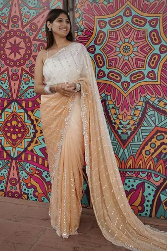 peach color trendy fendy satin fabric pedding with beads hand work saree