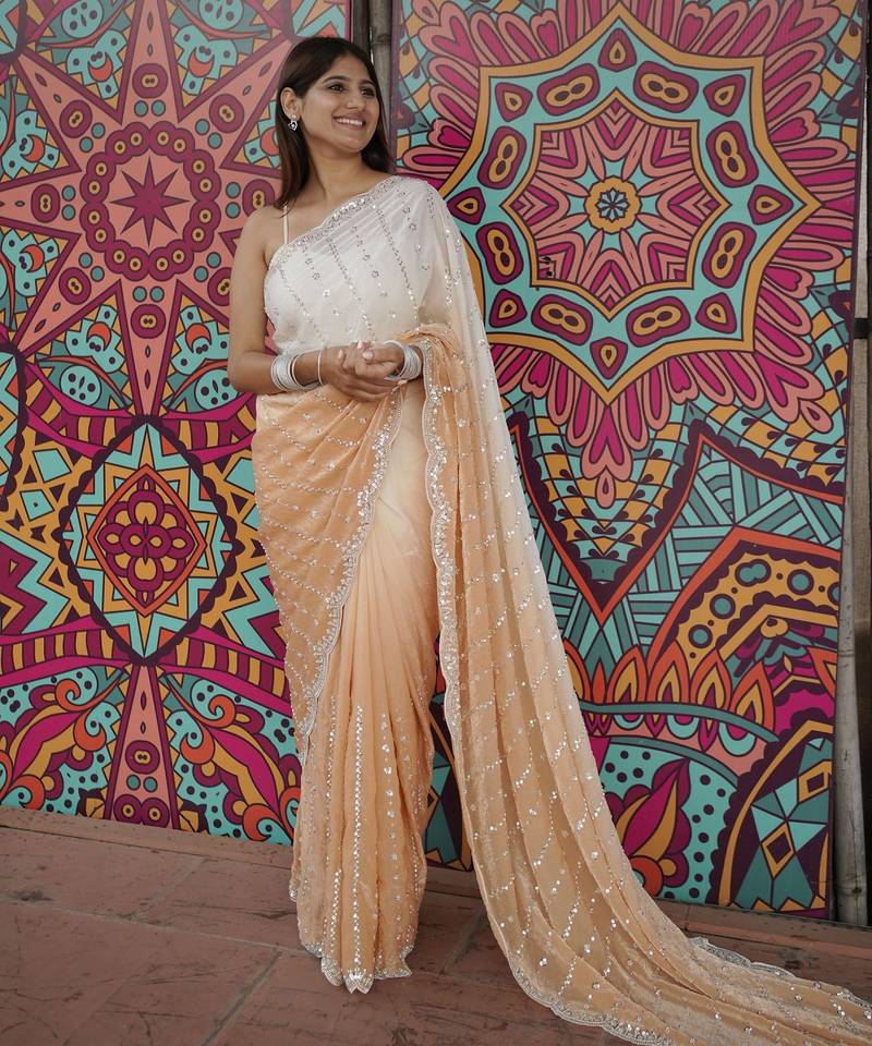 peach color trendy fendy satin fabric pedding with beads hand work saree