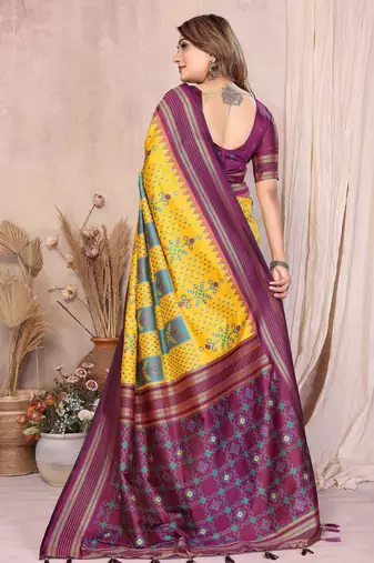 yellow soft silk blend blend ikkat weaving traditional partywear saree