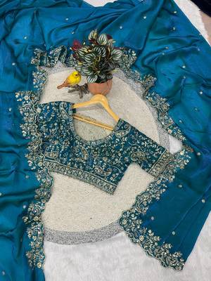blue color embroidered satin silk blend saree 1