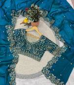 blue color embroidered satin silk blend saree