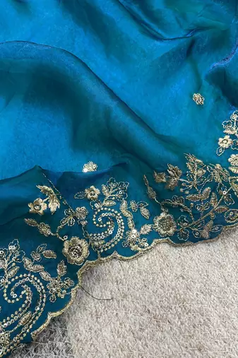 blue color embroidered satin silk blend saree