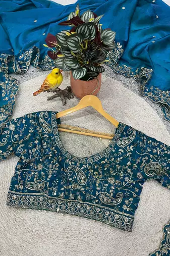 blue color embroidered satin silk blend saree