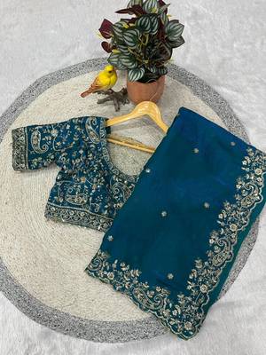 blue color embroidered satin silk blend saree 4