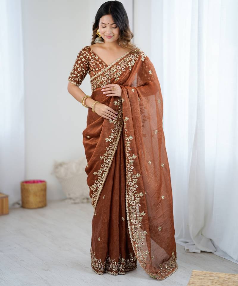 brown color trendy fendy chiffon fabric glamorous partywear saree