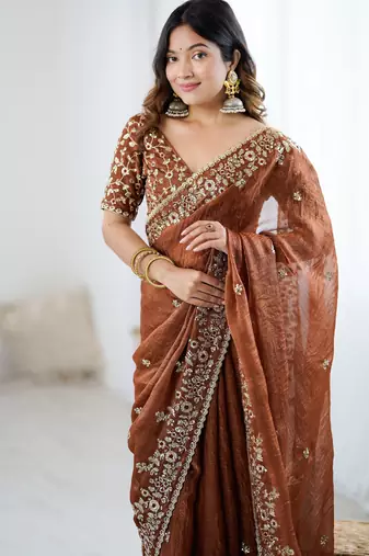 brown color trendy fendy chiffon fabric glamorous partywear saree