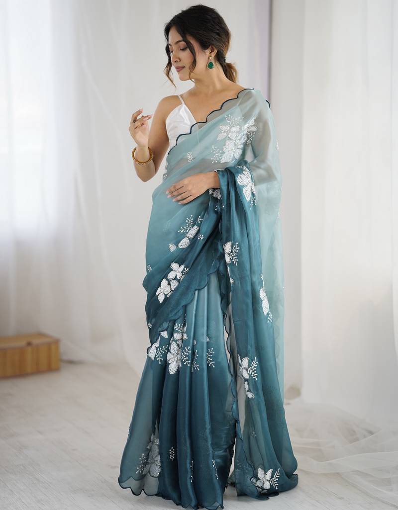 teal  color glamorous jimmy choo fabric beautiful embroidered saree