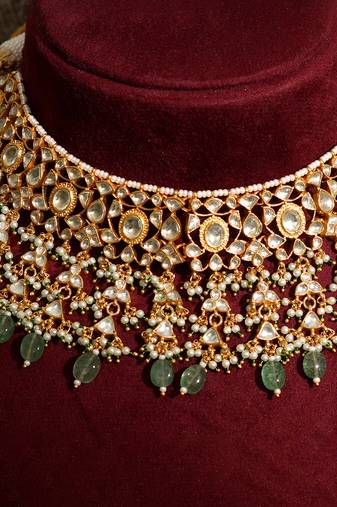 Gold plated kundan green stones necklace set
