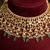 Gold plated kundan green stones necklace set