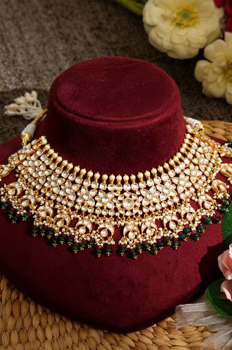 Gold plated kundan green stones necklace set