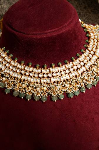 Gold plated kundan green stones necklace set
