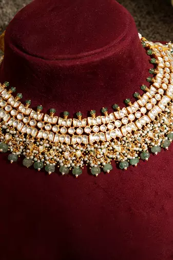 Gold plated kundan green stones necklace set