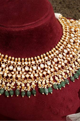 Gold plated kundan green stones necklace set