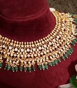 Gold plated kundan green stones necklace set