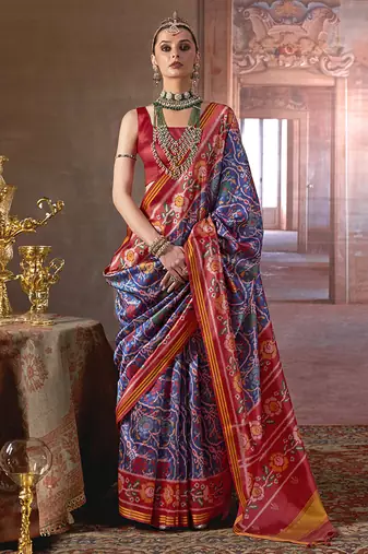 navy blue art silk blend patola print saree with red blouse