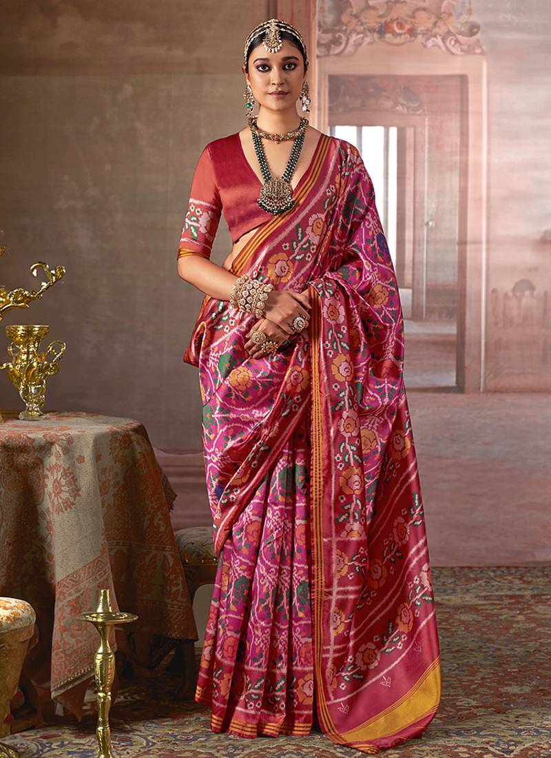 pink art silk blend patola print saree with red blouse