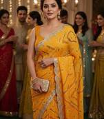elegant yellow georgette bandhani saree with designer jari cutwork border & banglori silk blend blouse