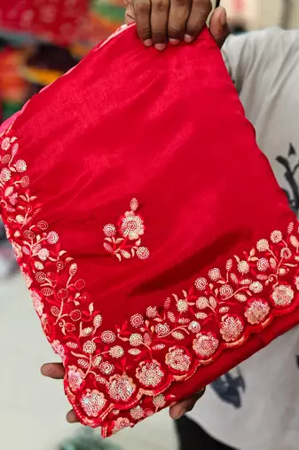 elegant red chiffon saree with heavy designer sequins & thread work and silk blend blend blouse