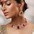 Gold plated kundan red stones necklace set