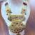 Golden necklace with green stone work  and kundan work