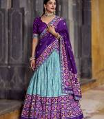 sky-blue Tasar Silk Ikkat Printed Lehenga Choli Set with Embroidered Blouse & Dupatta
