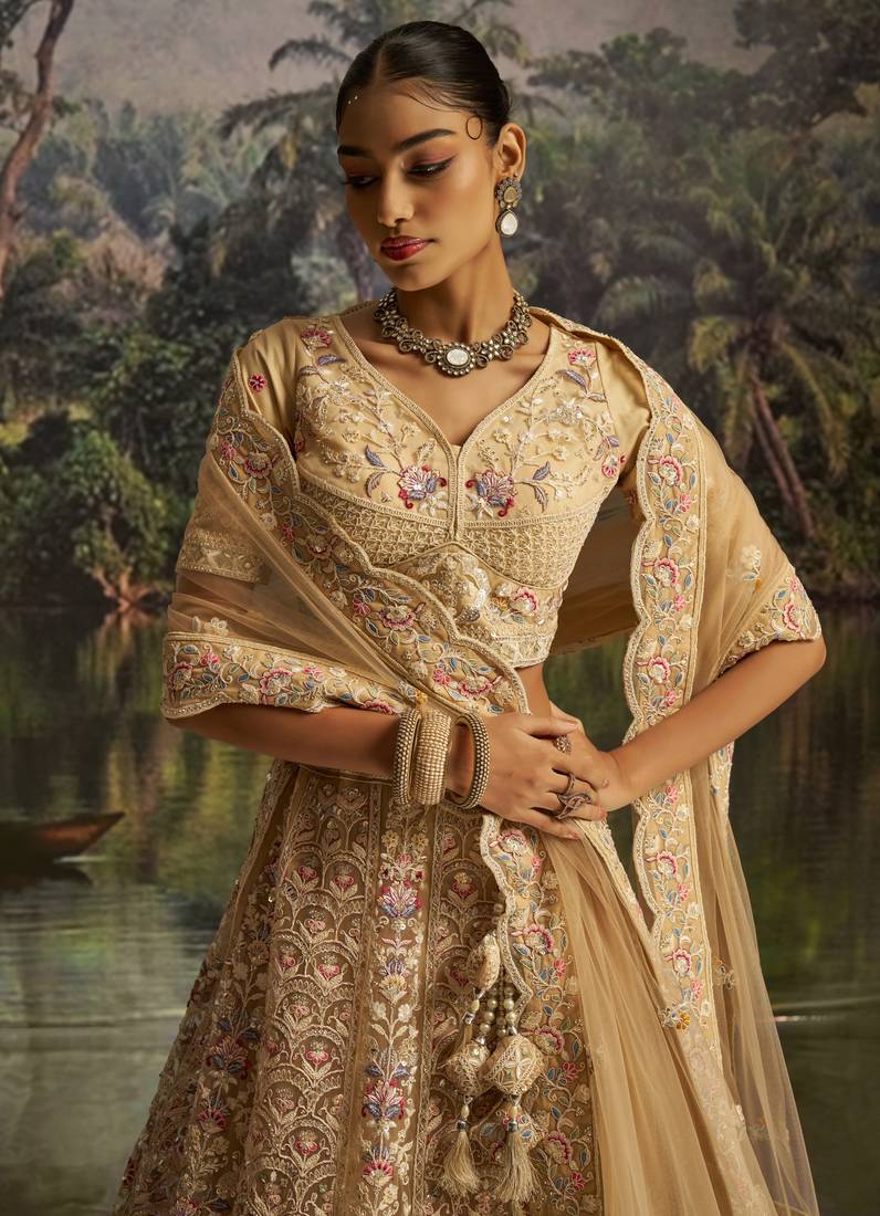 cream net embroidered lehenga choli with dupatta