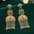 Gold plated kundan temple earrings with pearl tassels & green stone