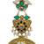 Gold plated kundan temple earrings with pearl tassels & green stone