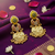 Gold plated kashmiri jhumka earrings with yellow kundan pearl drops & antique finish
