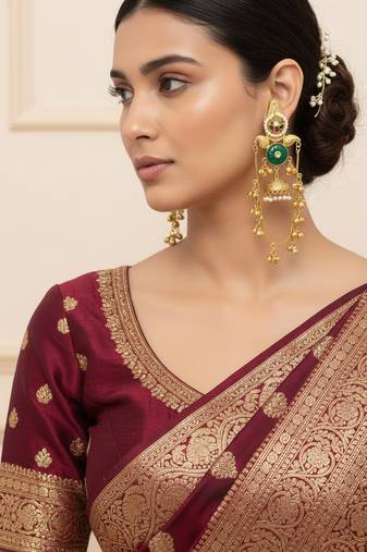 Gold plated kashmiri kundan pearl jhumka earrings with green stone & chain