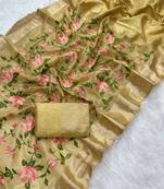 golden color floral tissue saree