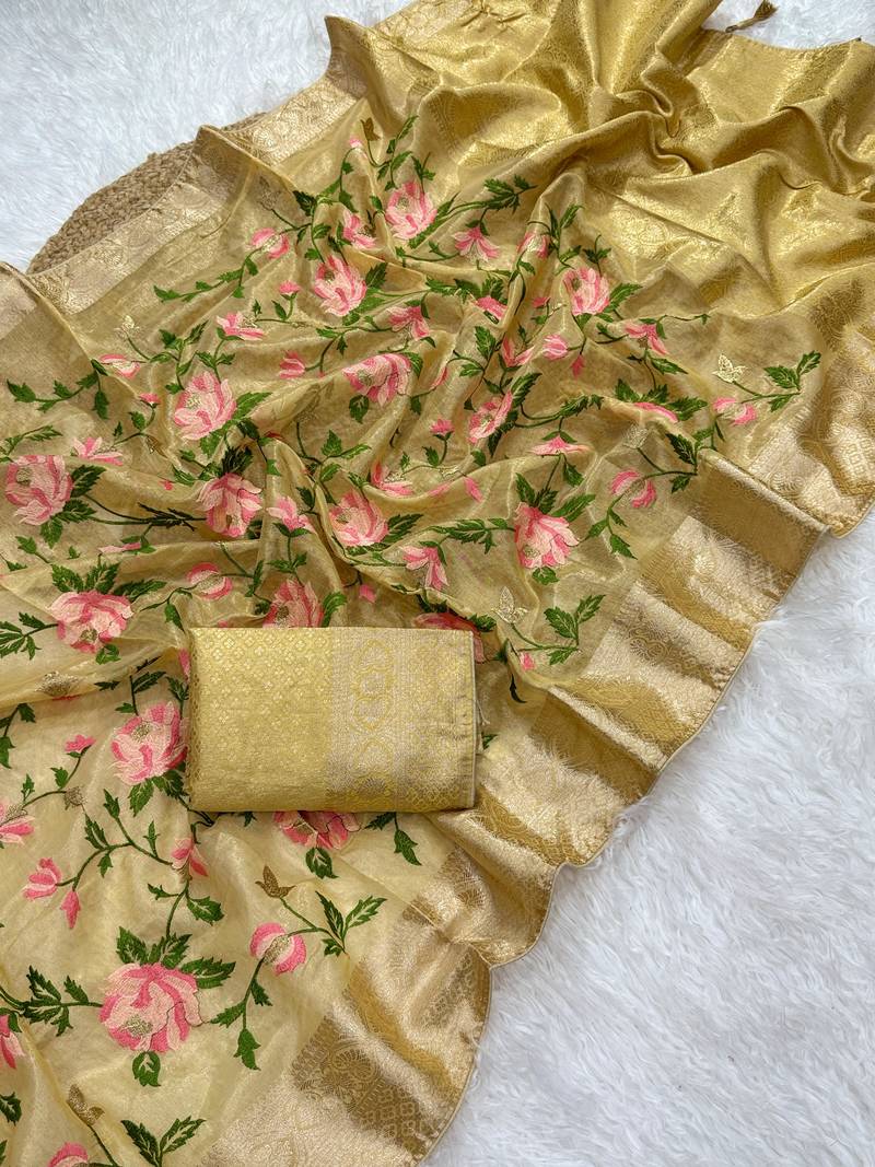 golden color floral tissue saree