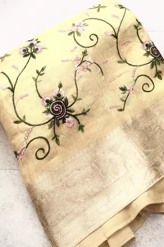 golden color floral tissue saree