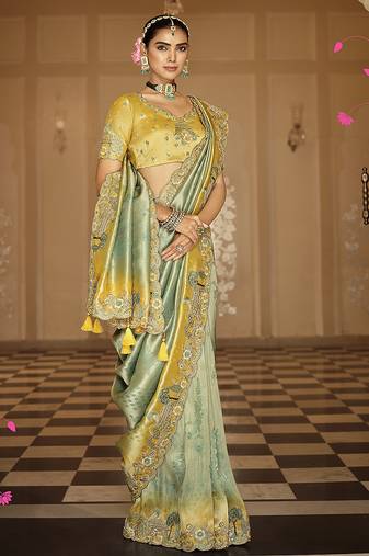 Silk blend saree in mint green & mustard yellow with meenakari zari weaving